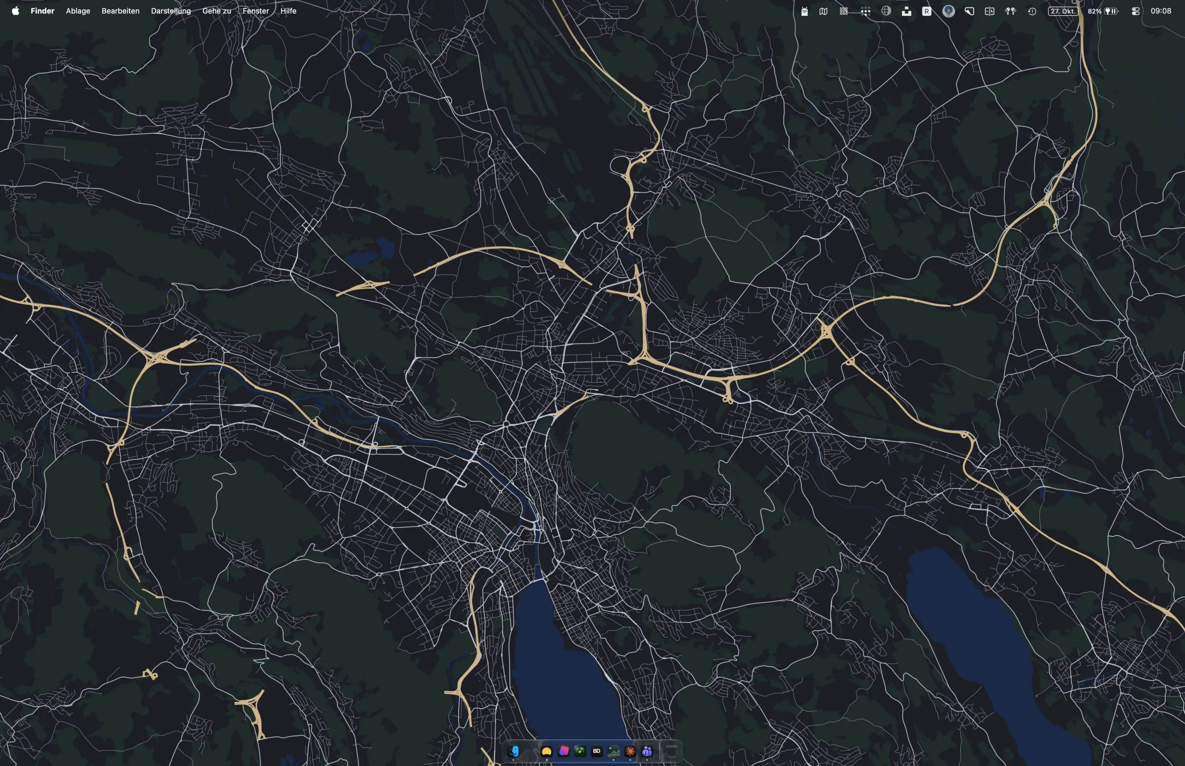 Deskmap with a custom map look: a dark map of Zurich as the desktop background, with the menu bar and Dock